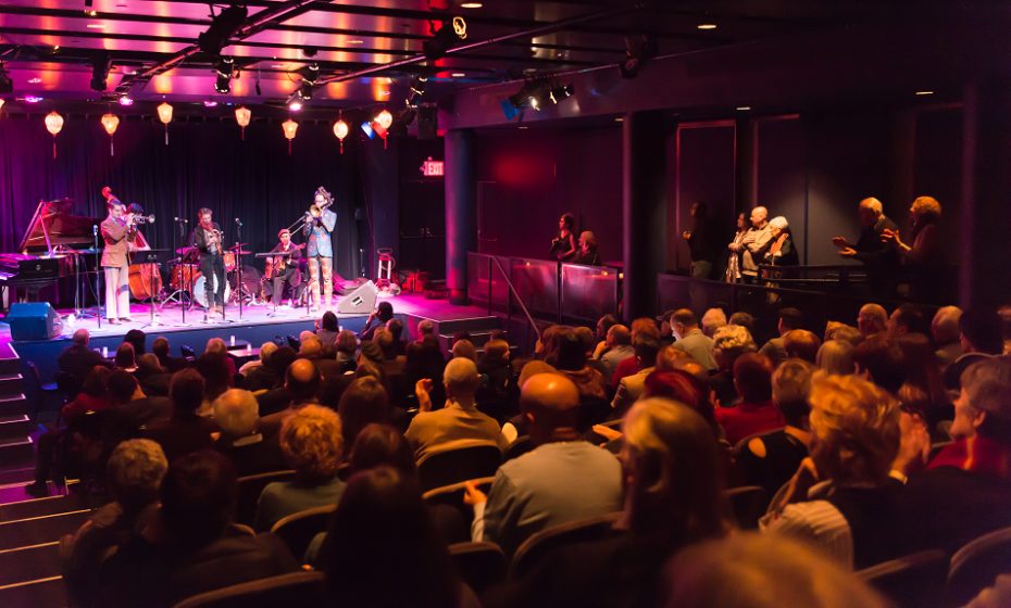 Performers on the Leonard Nimoy Thalia stage with a full audience.