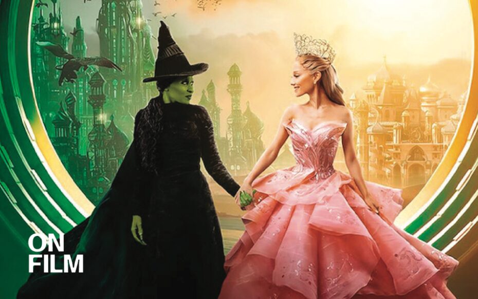 Image of Cynthia Erivo as Elphaba and Ariana Grande as Glinda holding hands.