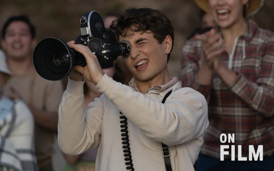 A still from the movie The Fabelmans, featuring a young man looking into a camera.