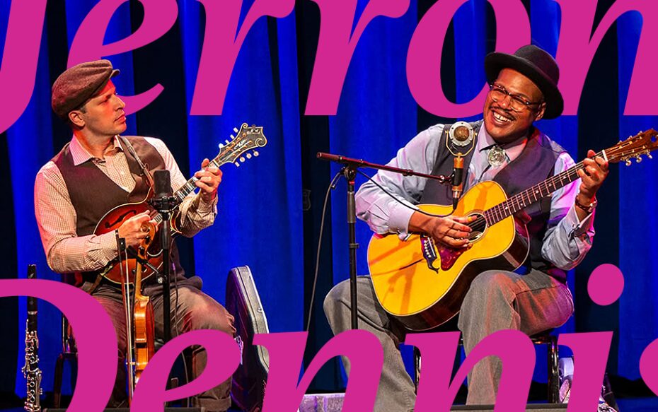 Jerron Paxton and Dennis Lichtman performing on the stage, with text that says, "Jerron Paxton and Dennis Lichtman."