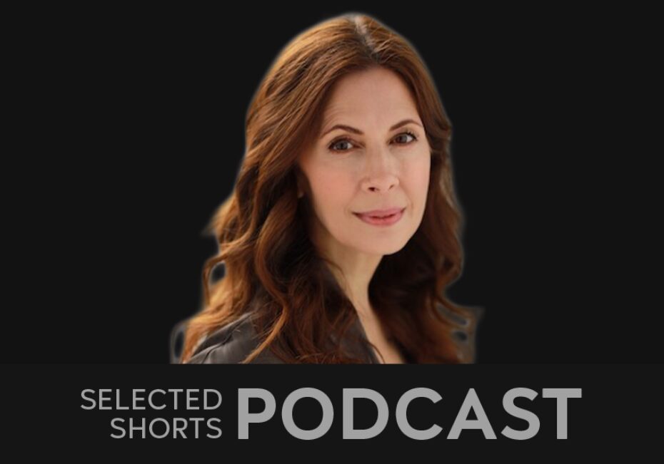 Jessica Hecht, a woman with long, brown hair is smiling towards us.