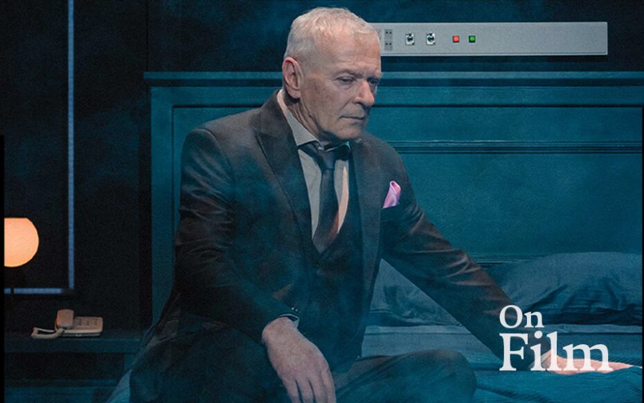 A scene from Long Day's Journey Into Night, featuring a man sitting on a bed.