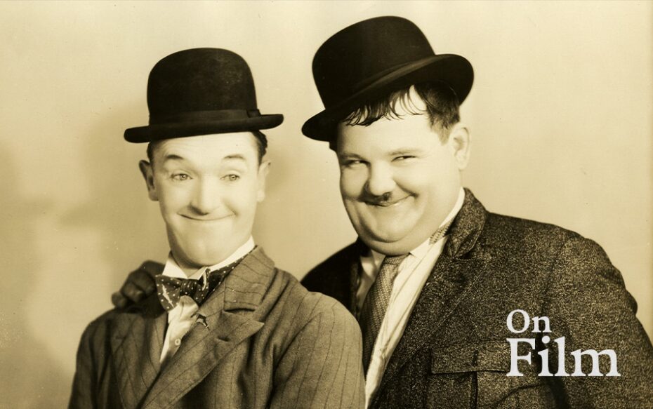 A black and white photo of Laurel and Hardy.