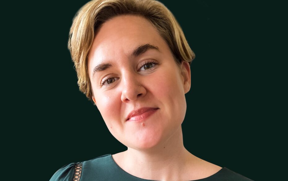 Headshot of Lulu Fogarty, smiling into the camera.