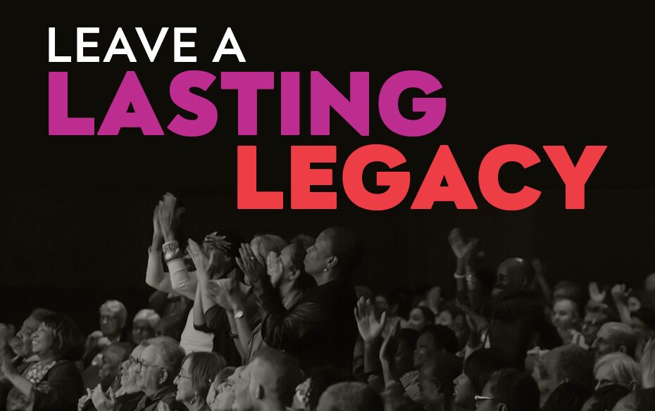 Audience members clap their hands.