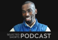DeRay Mckesson, a smiling man wearing a blue puffer vest.