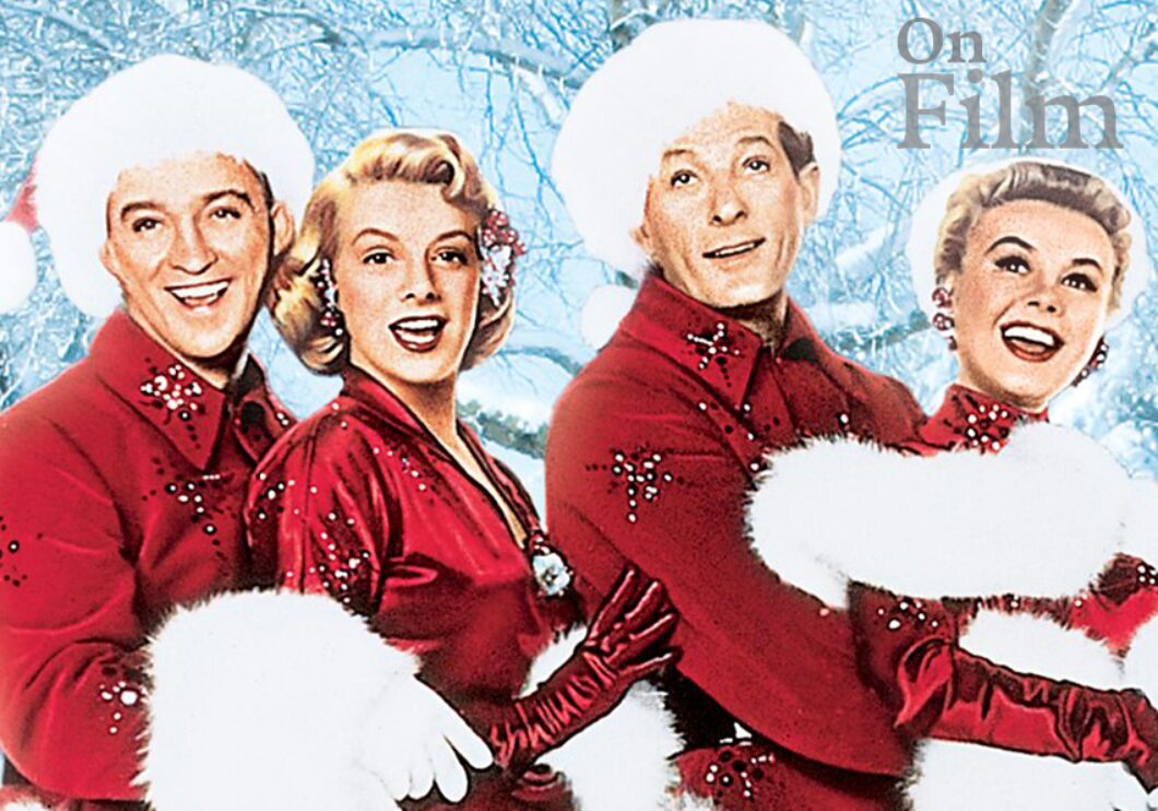 Bing Crosby, Danny Kaye, Rosemary Clooney, and Vera-Ellen wearing red and white outfits in the movie White Christmas.