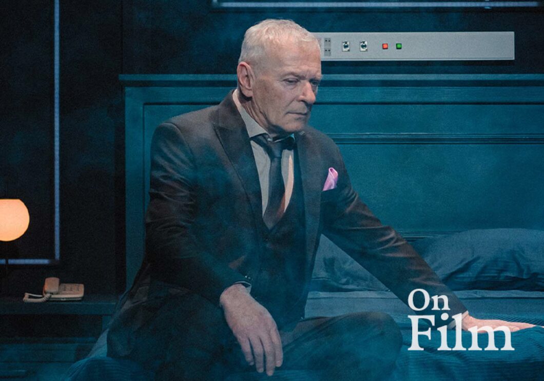 A scene from Long Day's Journey Into Night, featuring a man sitting on a bed.