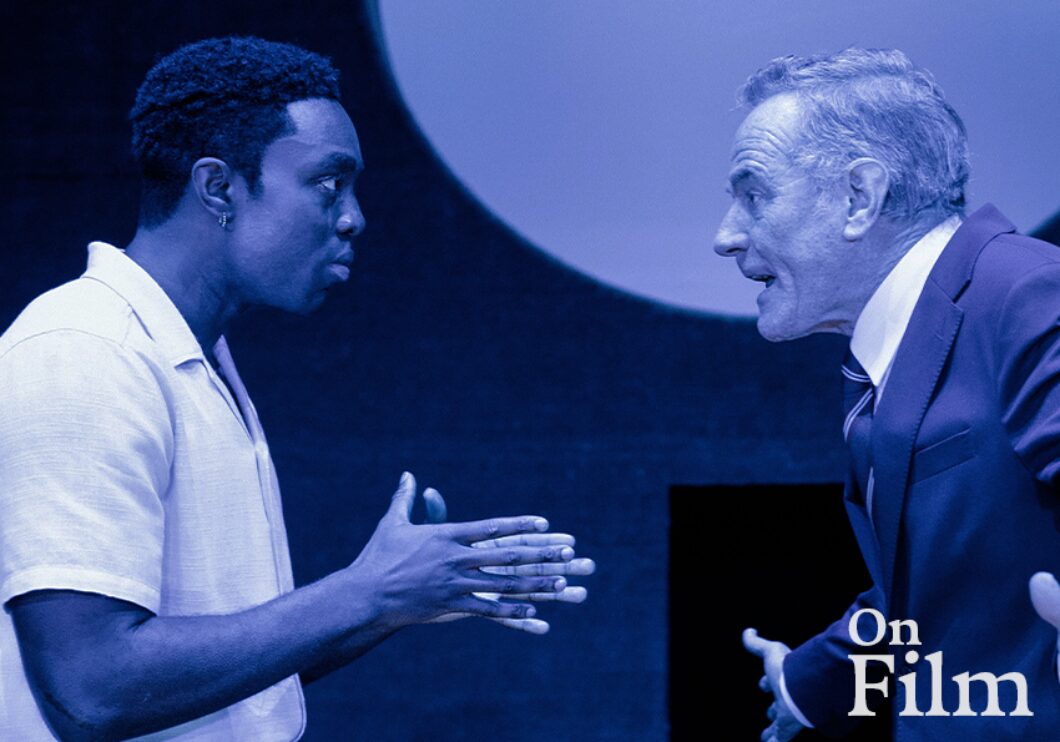 A still from All My Sons of two men talking.