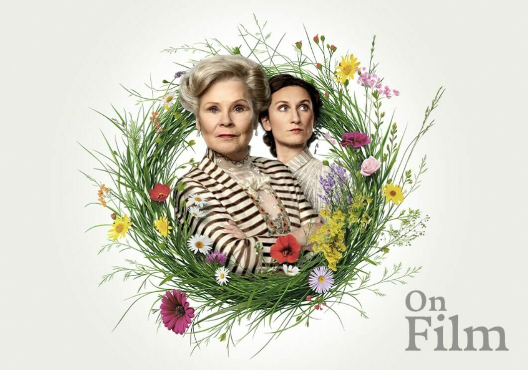 Actors Imelda Staunton and Bessie Carter in Mrs. Warren's Profession, surrounded by a floral wreath.