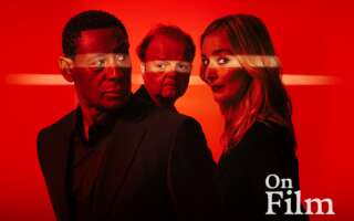The cast of London's West End: Othello in front of a red background.